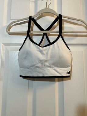 New Balance White Sports Bra with Black Trim and Strappy Back